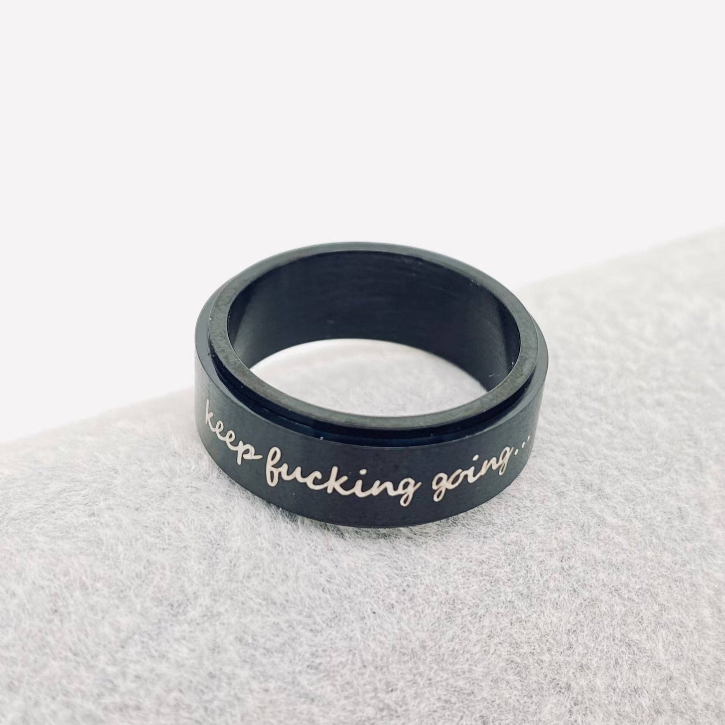 Drehbarer Edelstahlring „Keep Fcking Going“