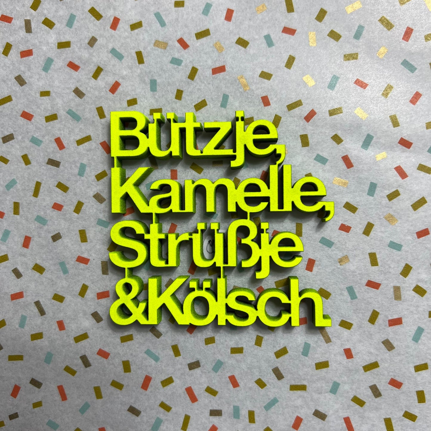 Schriftzug "Bützje, Kamelle, Strüßje & Kölsch" nogallery