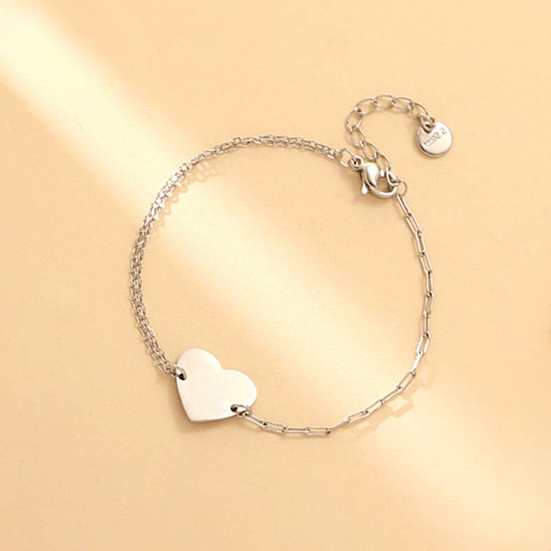 Silbernes Armband mit Herzanhänger