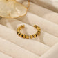 Ring aus Goldwürfeln