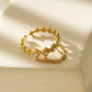 Vergoldeter Ring mit Perlen