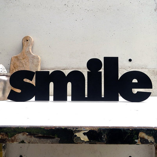 Schriftzug " SMILE"